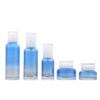 Fuyun  new cosmetic 40ml 100ml 120ml 50g 30g blue gradient lotion pump spray glass bottle and jar set